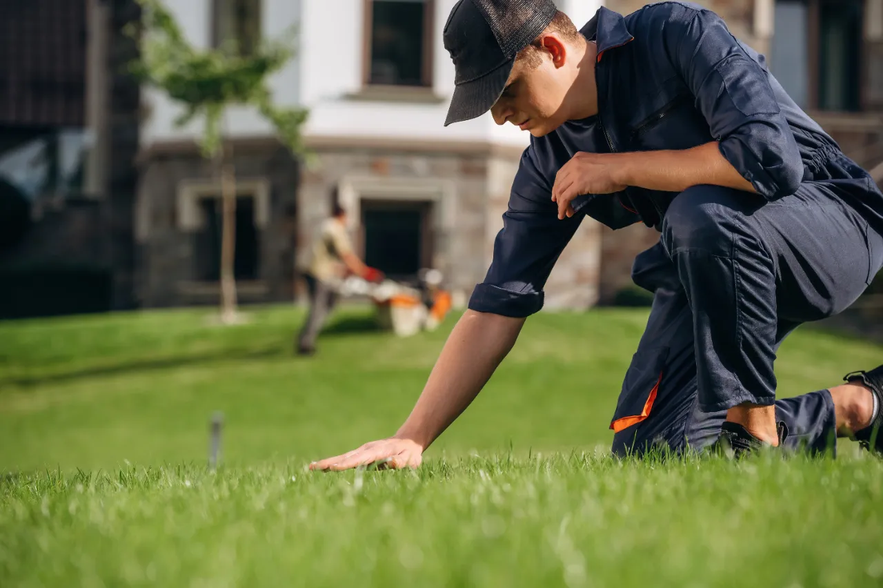 Crew inspecting a freshly mowed lawn in New Jersey